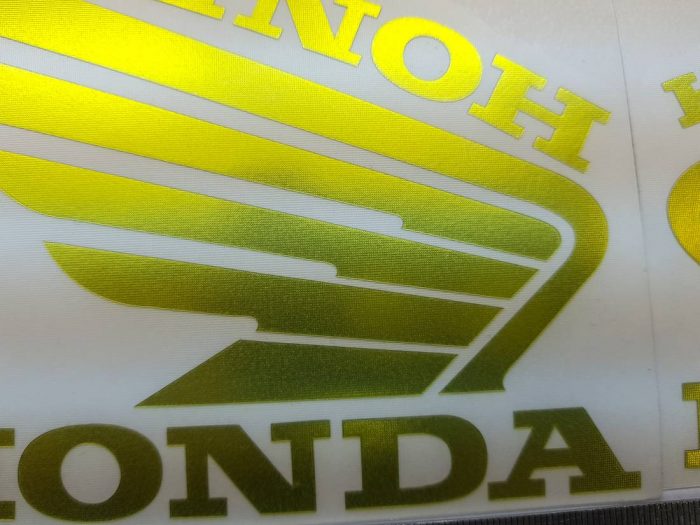 Наклейка Крылья Honda жёлтый хром