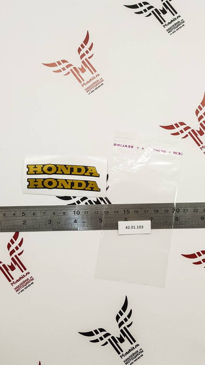 Маленькие золотые надписи Honda
